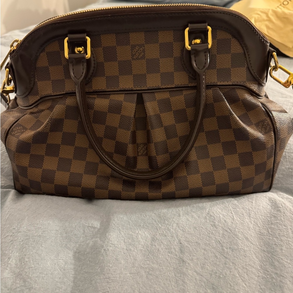 Brown Satchel with Classic Dome Shape and Gold-Toned Hardware